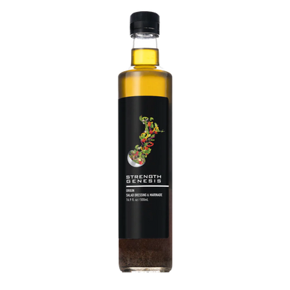 Origin salad dressing bottle with a black label featuring colorful vegetable graphics, 16.9 fl oz.